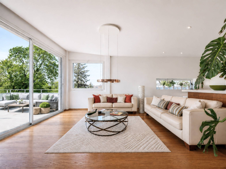 Elegante attico contemporaneo di 6,5 locali a due passi dal quartiere di Chailly. 